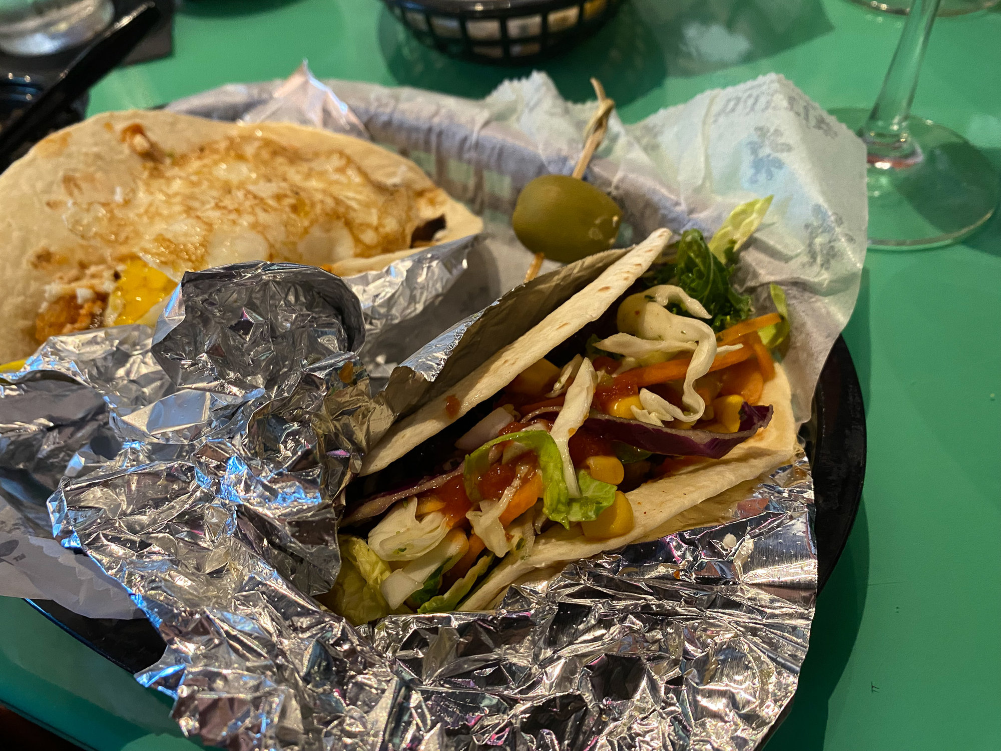 Tacos wrapped in foil slightly opened